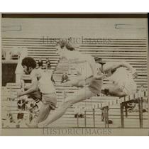 1973 Press Photo Men jumping on hurdles - RRW91789