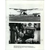 1981 Press Photo John Chotia flying his plane and a worker operates drill press