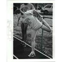 1989 Press Photo Karl Knoll stretching before running at CWRU Finnigan Field