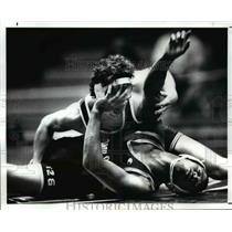 1988 Press Photo Charles Myles Uses his Hand to Fend Off Dan Donovan - cvb53024