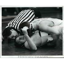 1991 Press Photo Gino Rumplik, Twinsburg, attempts to pin Bailey in wrestling.