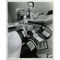 1993 Press Photo Electronic Cash Register Sales Pick Up