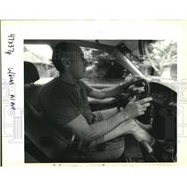1992 Press Photo Albert Segraves drives with his pistol through bad neighborhood