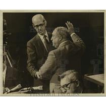 Press Photo Roger Suerat swears in Doctor John Langum during NOPSI Hearing