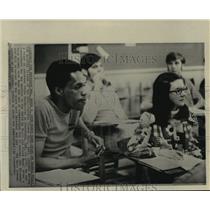 1972 Press Photo Top hurdler in world, Thomas Hill, in Arkansas State classroom.