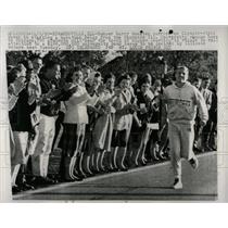 1960 Press Photo Harry Moulten Runs Marathon w/ Torch - RRW89045