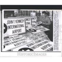 1963 Press Photo J.P Bohan Inspects Airport Signs