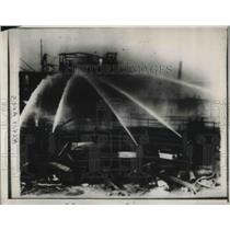 1932 Press Photo Firemen at the scene of a raging fire - neb95364