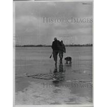 1961 Press Photo Father and Son Ice Fishing, Port Clinton, Ohio