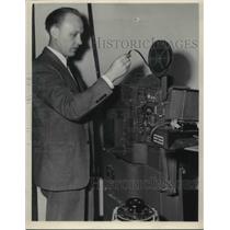 1948 Press Photo Albert L. Odeal Operates Television Film Projector