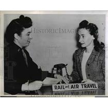1946 Press Photo Lt. C.E. McManimie and Hamiltin Fields assist Patricia Vought
