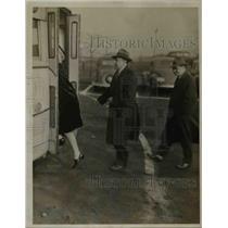 1946 Press Photo Employees riding at a transportation at the parking area