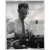 1960 Press Photo John E.Taber hooks up Telebit Communication system in Pioneer.