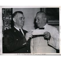 1947 Press Photo Fireman Presents Sen. Tom Connally With $800 Check  - nee63272