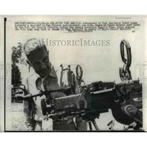 1966 Press Photo Henry Cabot Lodge inspects captured 12.7mm Chinese Gun.