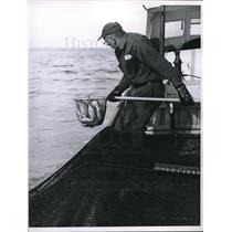 1959 Press Photo John Nemclek, Fishing on his boat