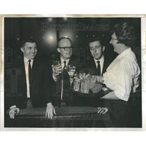 1968 Press Photo Reunion Marroned Pilots Snowfall Drink
