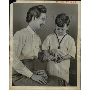 1956 Press Photo Adhesive Bandage Bandaid with Playtime Pictures for Children