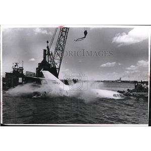 1968 Press Photo of plane being lifted from Lake Eerie. - nee08720