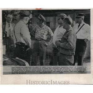 1957 Wire Photo Police Muller watches the investigation of the dynamite bombing