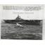 1959 Press Photo Anti Submarine Warfare helicopter past battleship Tarawa