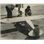 1951 Press Photo Martell adjusts the motor of Mr Mulligan's Model Plane