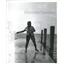 1964 Press Photo Fisherman catch fish swinging pier way - RRX88533