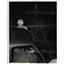 1942 Press Photo Air raid Warden Looks as Motorist switches on Auto Headlights