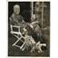 1942 Press Photo Tris Speaker and his pet dog, Laddie, relax and enjoy the sun