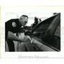 1994 Press Photo E.L. Brown Checks Stolen Car for Fingerprints, Kenner, LA