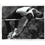 1987 Press Photo Chip Morris in helping Cleveland Hts. set a new Weingart Relays