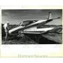 1989 Press Photo Samuel Chase Looks at His Nose Down Plane, Vincent Airport
