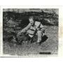 1950 Press Photo Hunter Wallace Taber with wart hog and gun in Africa