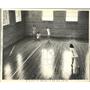 1941 Press Photo Ladies Playing A Softball Game On The Hardwood Floors Of A Gym