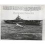 1959 Press Photo Anti Submarine Warfare helicopter past battleship Tarawa