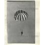 1966 Press Photo Hanging Below Parachute Sky Diver Descends To Landing Zone