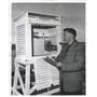 1958 Press Photo Meteorologist takes readings at O'Hare - RRW38467