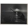 1936 Press Photo A lone fisherman at sunset on his boat - nea79531