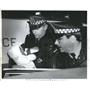 1993 Press Photo  policemen carries an abandon baby