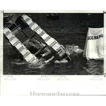 1986 Press Photo Titanic II flips on Cuyahoga River at Ohio Riversfest.