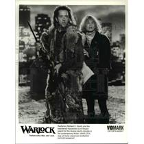 1991 Press Photo Richard E. Grant and Lori Singer star  in Warlock - cvp34942