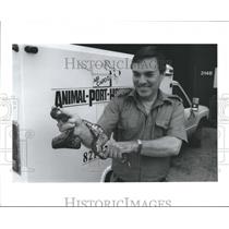1988 Press Photo om Schooler holds a boa snake from Belize, Houston - hca06290