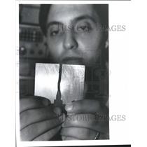 1988 Press Photo Marwan Zaini examines fatigue crack, Airplane safety