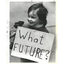 1984 Press Photo Little Angie Hanak holds "What future" - RRW49639