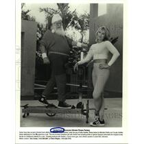 1998 Press Photo Santa Claus and Kathy Kaehler try new Nordic Track equipment