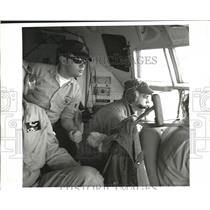 1969 Press Photo Ice Observers aboard Hercules Aircraft for ice patrol missions