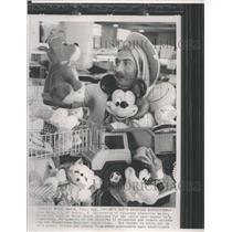 1992 Press Photo Jon Knox with lots of toys. - RSH80315