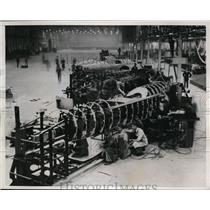 1937 Press Photo Men assembling fuselages of Planes at Austin Factory.