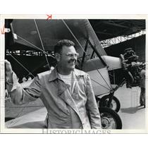 1976 Press Photo Buck Hilbert and his vintage swallow Airplane