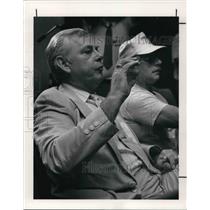 1990 Press Photo Dan Martin, District Director of the USW holds a wooden pellet